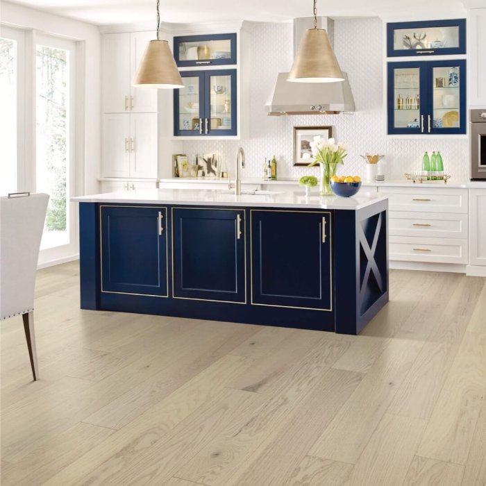 Durable wide plank light flooring in a kitchen