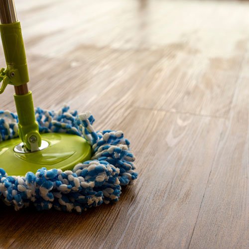 Cleaning luxury vinyl flooring with a mop