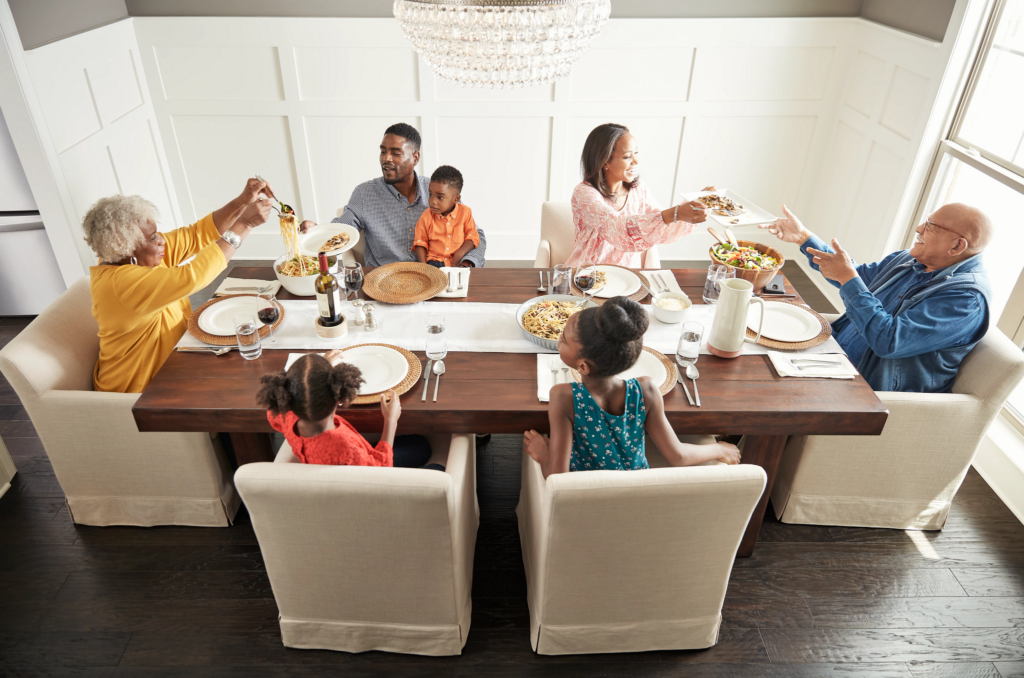 Family having breakfast at the dining table | Barrett Floors